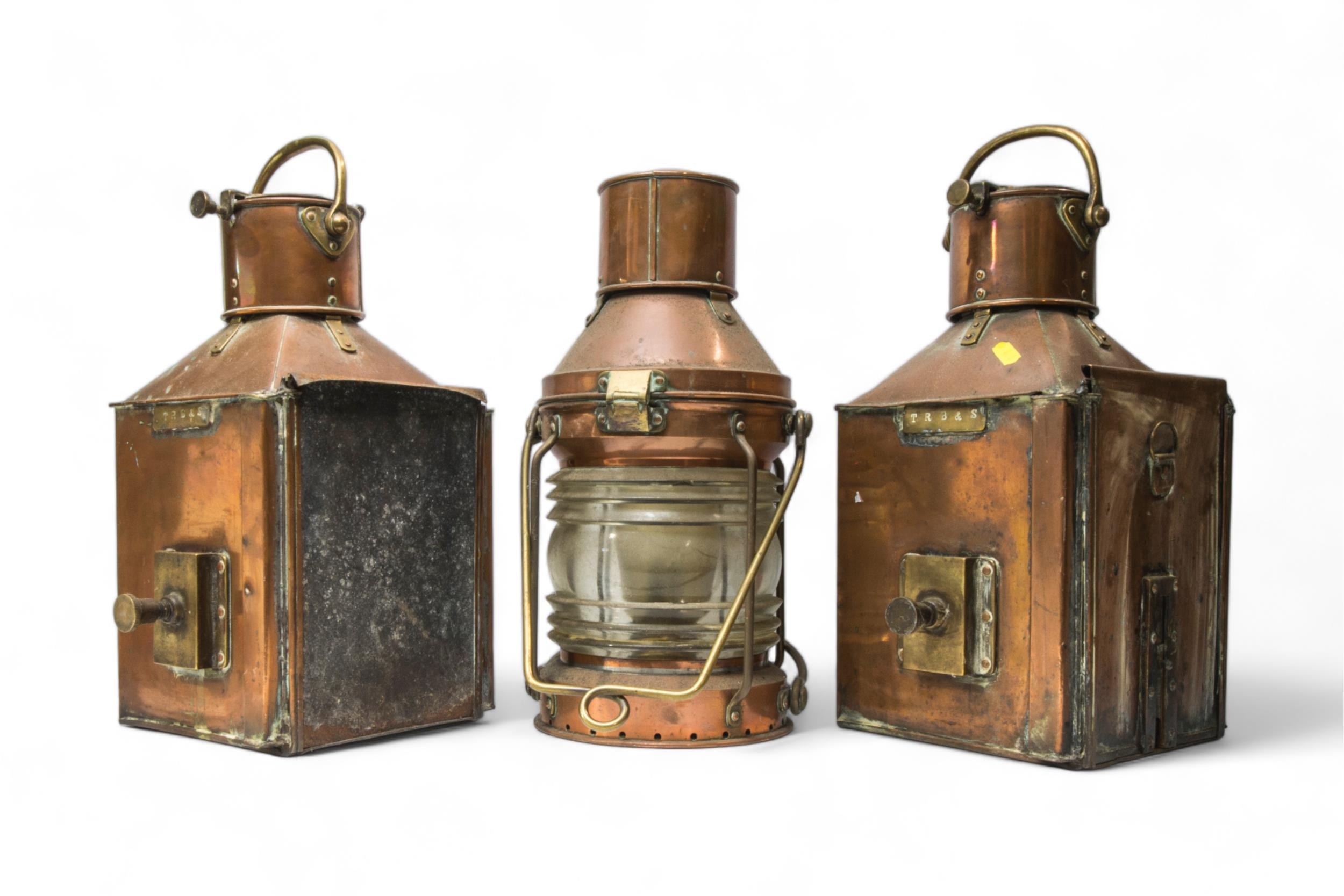 TWO MATCHING COPPER AND BRASS BOAT LANTERNS with plaques for ‘Bow Port Patt 23’ and makers stamped