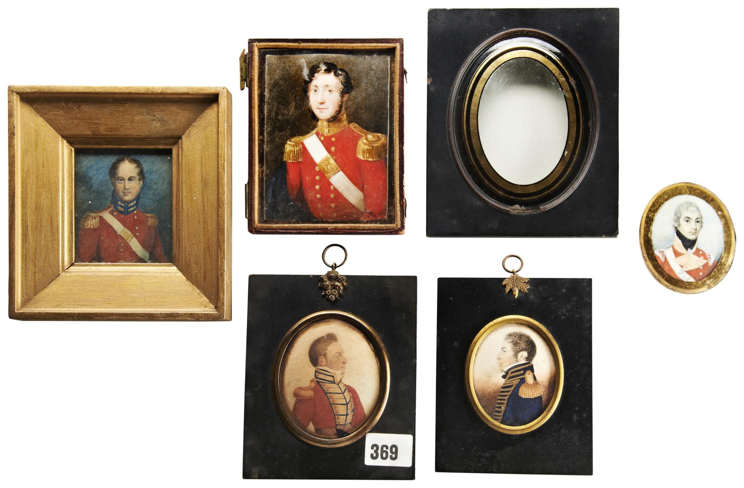 AN EARLY 19TH CENTURY PORTRAIT MINIATURE OF AN OFFICER, in an oval gilt mount ad paper mache frame