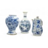 A DELFT GUGLET AND A VASE 18th century, guglet is 22.5cms high, along with a coffee pot