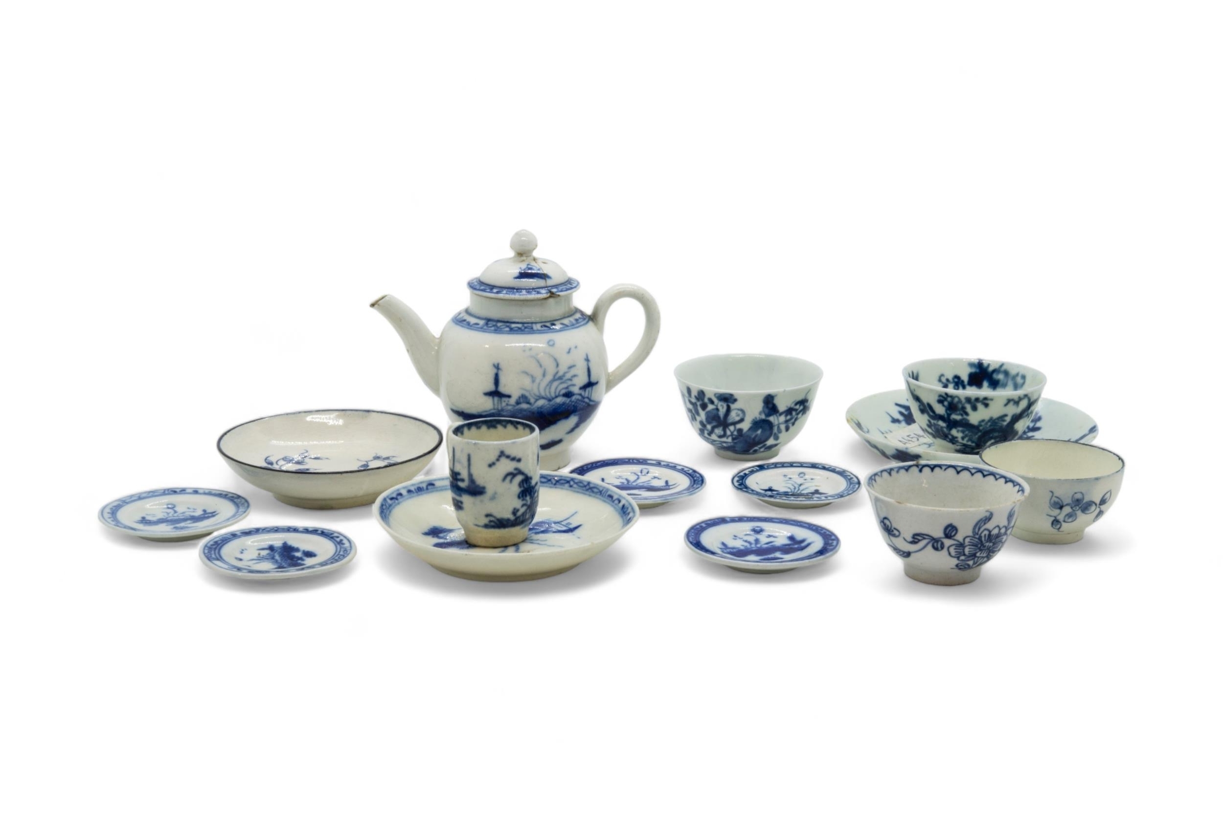 A GROUP OF BLUE AND WHITE MINIATURES Mid 18th century, a teapot, five miniature plates (one - Image 2 of 2