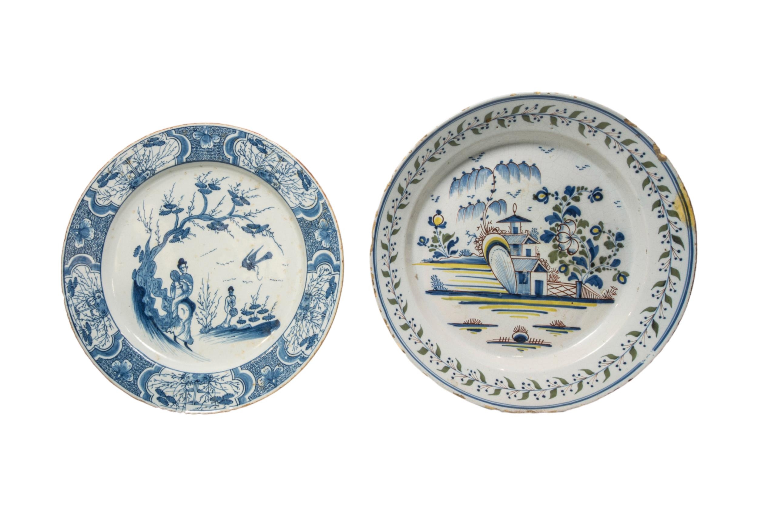 FIVE TIN GLAZED CHARGERS 18th century, including a Bristol example in the Niglet style, 33cms wide - Image 3 of 6
