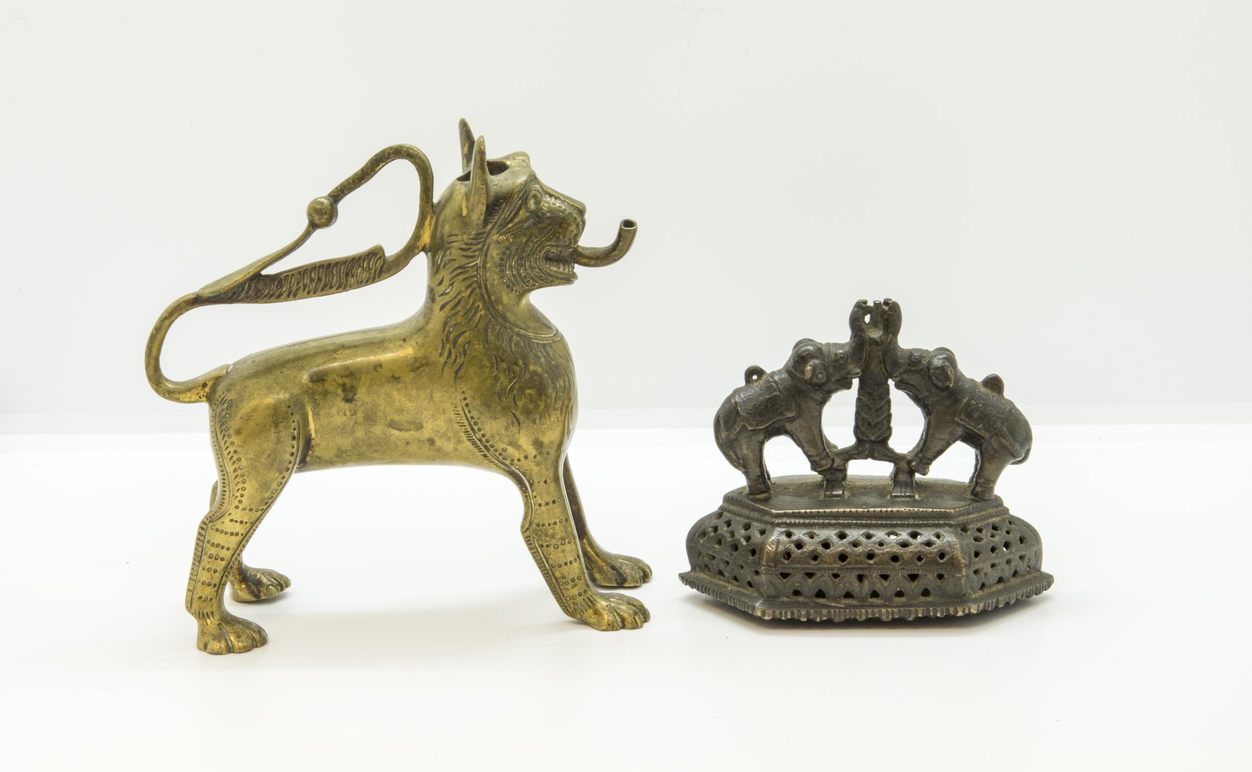 AN INDIAN COPPER ALLOY ELEPHANT ‘CANDLESTICK’, a horse, a wheel-along-fish, an oil lamp, and other - Image 3 of 5