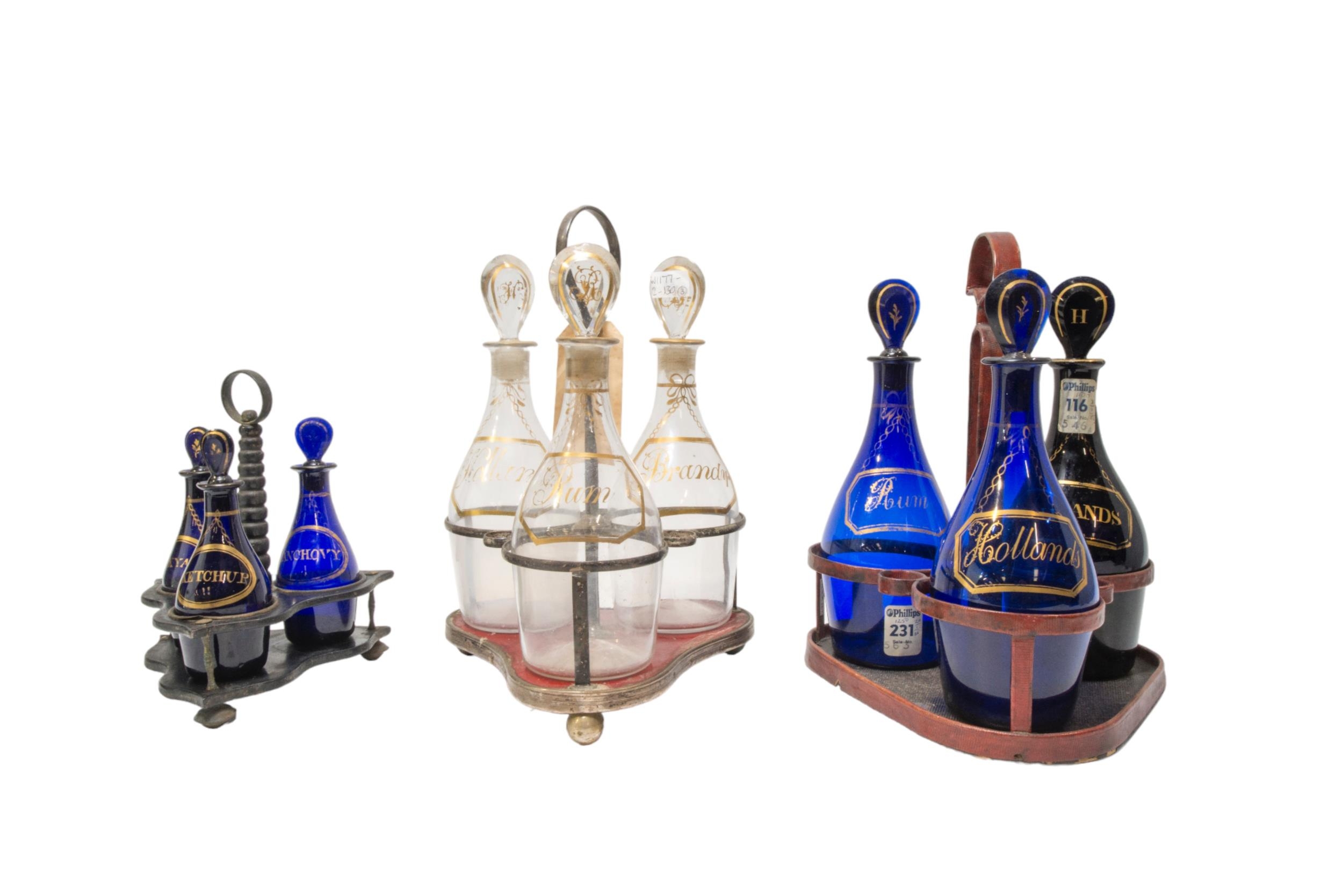 A NEAR MATCHED TRIO OF BRISTOL BLUE DECANTERS, LATE 18TH / EARLY 19TH CENTURY, the gilt painted