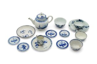 A GROUP OF BLUE AND WHITE MINIATURES Mid 18th century, a teapot, five miniature plates (one
