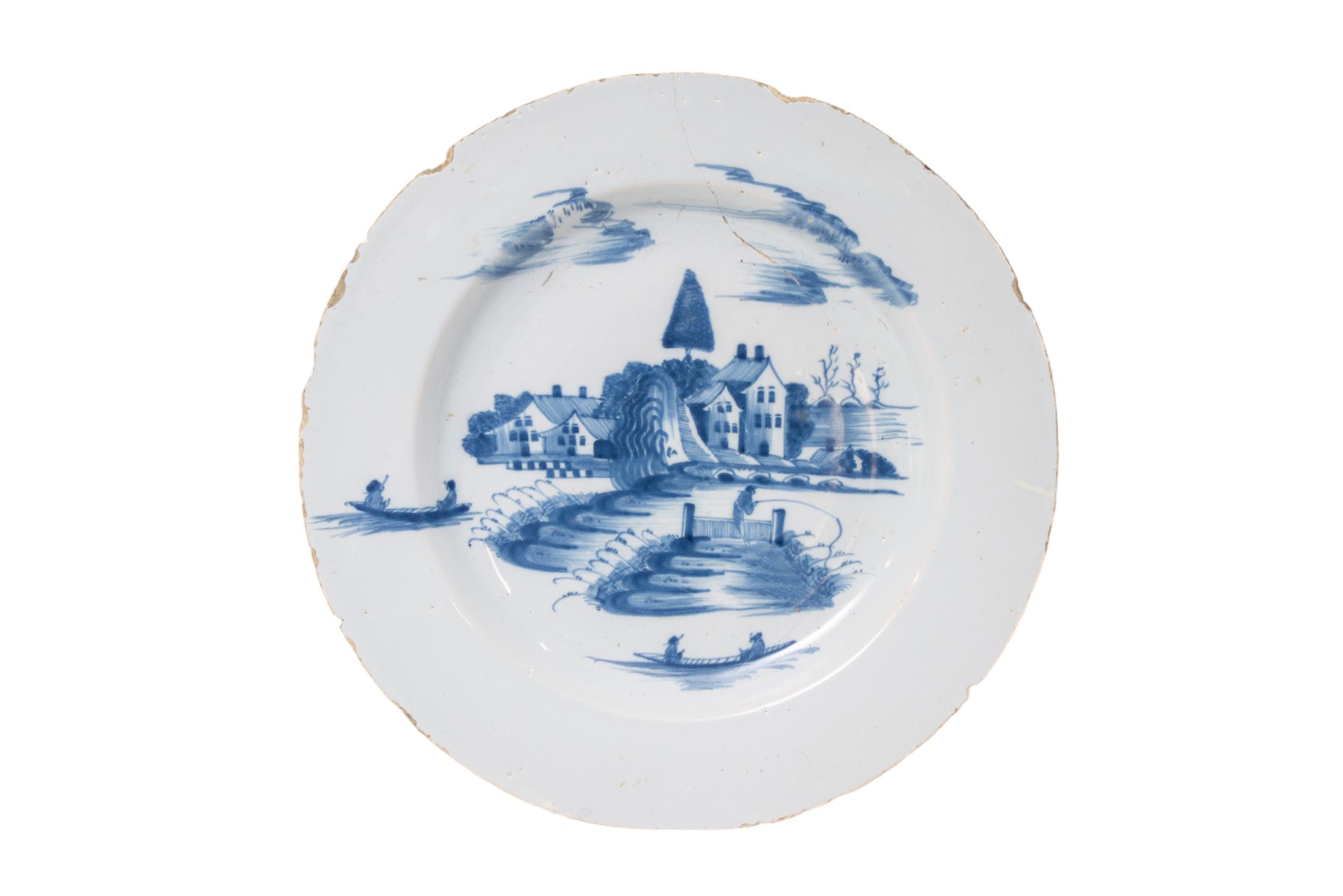 THREE LARGE DELFT DISHES, 18TH CENTURY, consisting of two dishes painted with traditional rural - Image 2 of 4