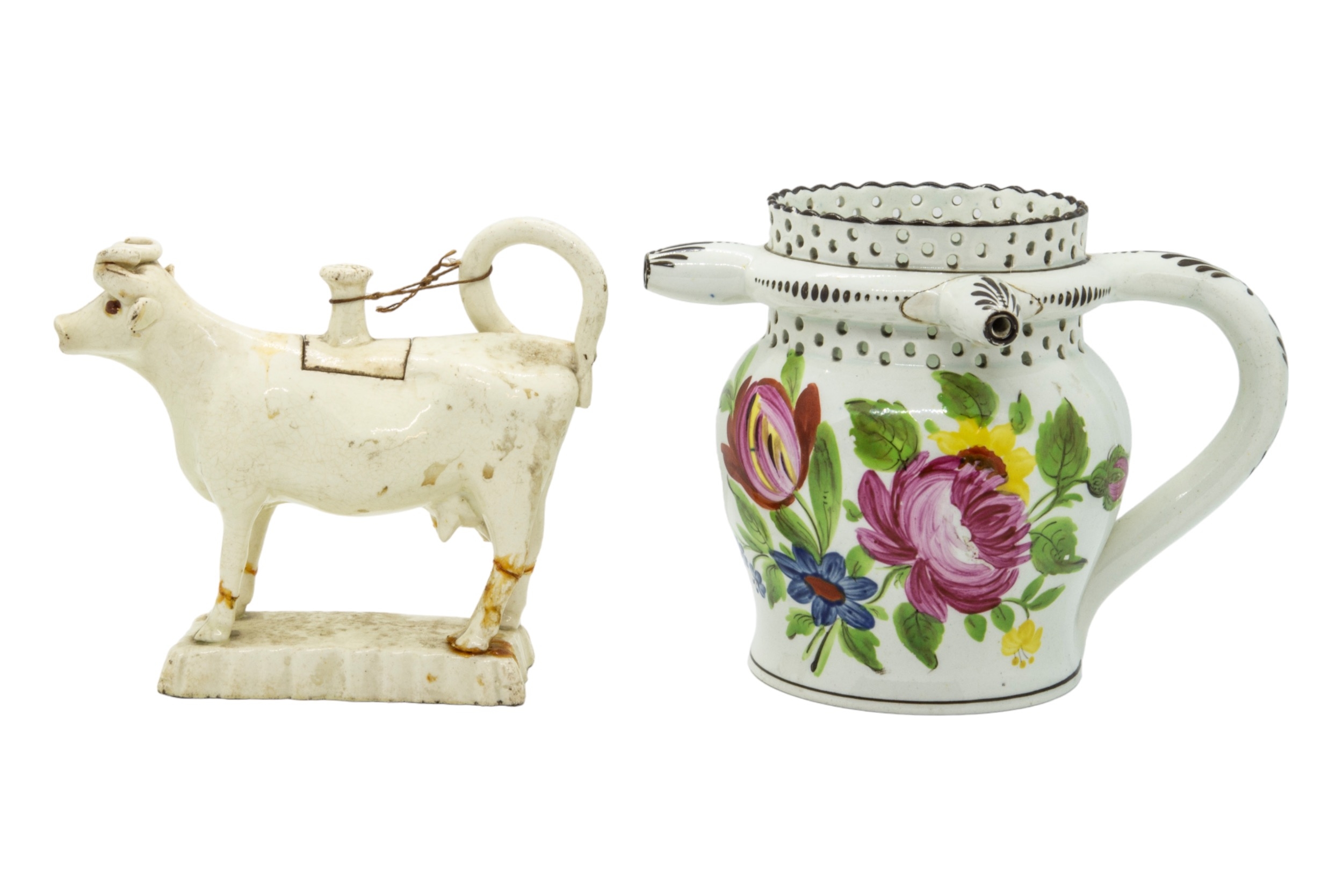 A WILLIAM FIFEILD BRISTOL PUZZLE JUG Circa 1830, together with creamware cow creamer, 12cms high