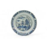 SIX DELFT PLATES 18th Century, one inscribed "T.M.LANE", 23cms wide