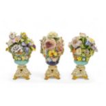 A PAIR OF DERBY FLORAL VASES Circa 1830, and a further vase, 37cms high