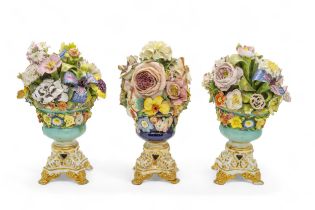 A PAIR OF DERBY FLORAL VASES Circa 1830, and a further vase, 37cms high
