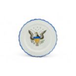 A BLUE FEATHER EDGE PLATE WITH THE AMERICAN EAGLE Early 19th century, 20.5cms