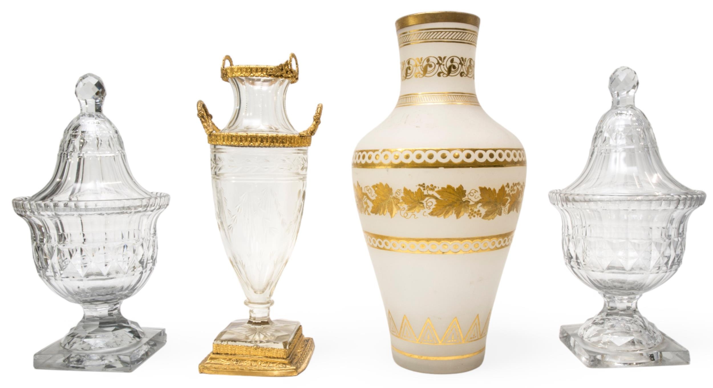 A 19TH CENTURY AMPHORA FORM GLASS VASE, with gilt metal mounts, the sides cut with laurel leaf
