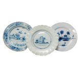 THREE ENGLISH DELFT DISHES, 18TH CENTURY, the lot includes a dish with a scalloped rim, a dish