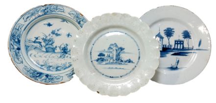 THREE ENGLISH DELFT DISHES, 18TH CENTURY, the lot includes a dish with a scalloped rim, a dish