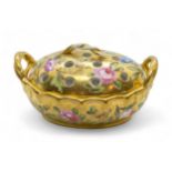 AN EARLY 19TH CENTURY VIOLET POT Circa 1820, scattered flowers on a gold ground, 10cms wide