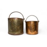 A LARGE COPPER AND BRASS COAL/LOG BUCKET with riveted border and swing handle and another smaller.