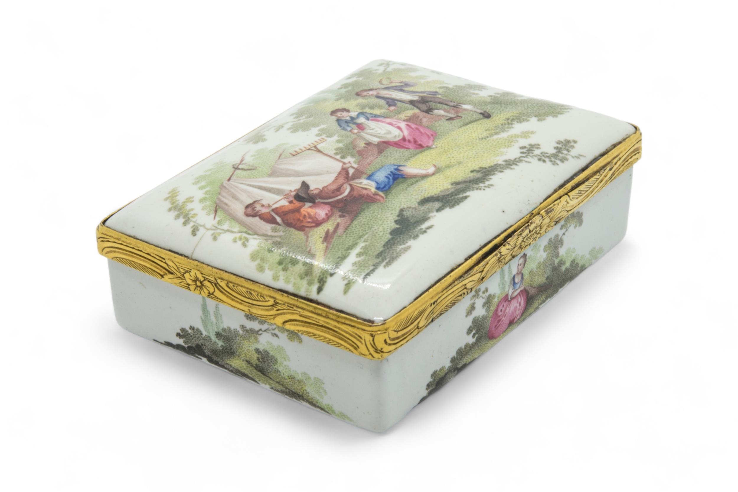 AN ENAMEL TABLE SNUFF BOX Mid 18th century, with female portrait to the interior, 8.5cms
