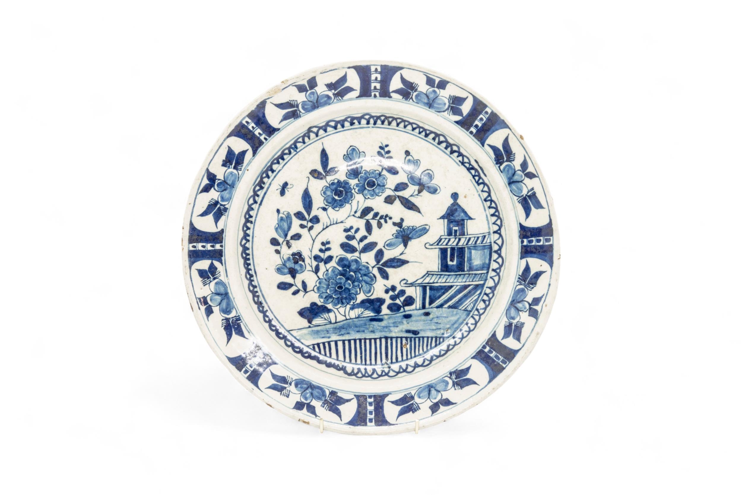 THREE DELFT CHARGERS 18th Century, and a faience charger, 36cms wide - Image 3 of 7