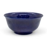 A CHINESE BLUE-GLAZED 'DRAGON' BOWL LATE QING DYNASTY bears an apocryphal Qianlong incised six