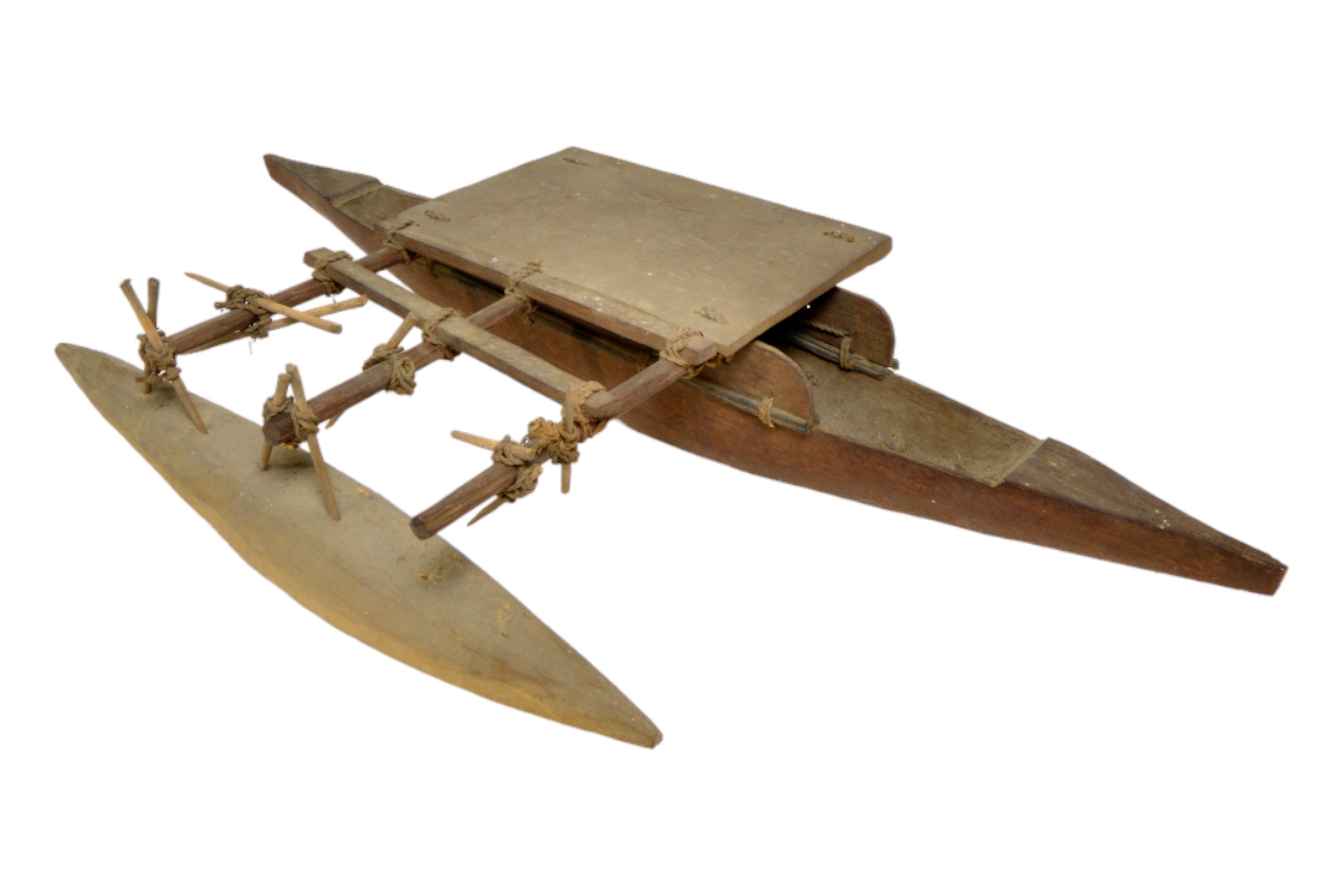 A CARVED WOODEN DAGGER SHEATH, a model of a South Seas outrigger, and various ethnographic ceramics, - Image 3 of 6