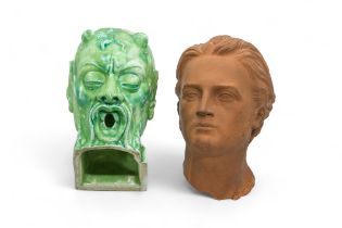 A TERRACOTTA MALE BUST Late 19th century, together with a green glazed grotesque head, 18cms high