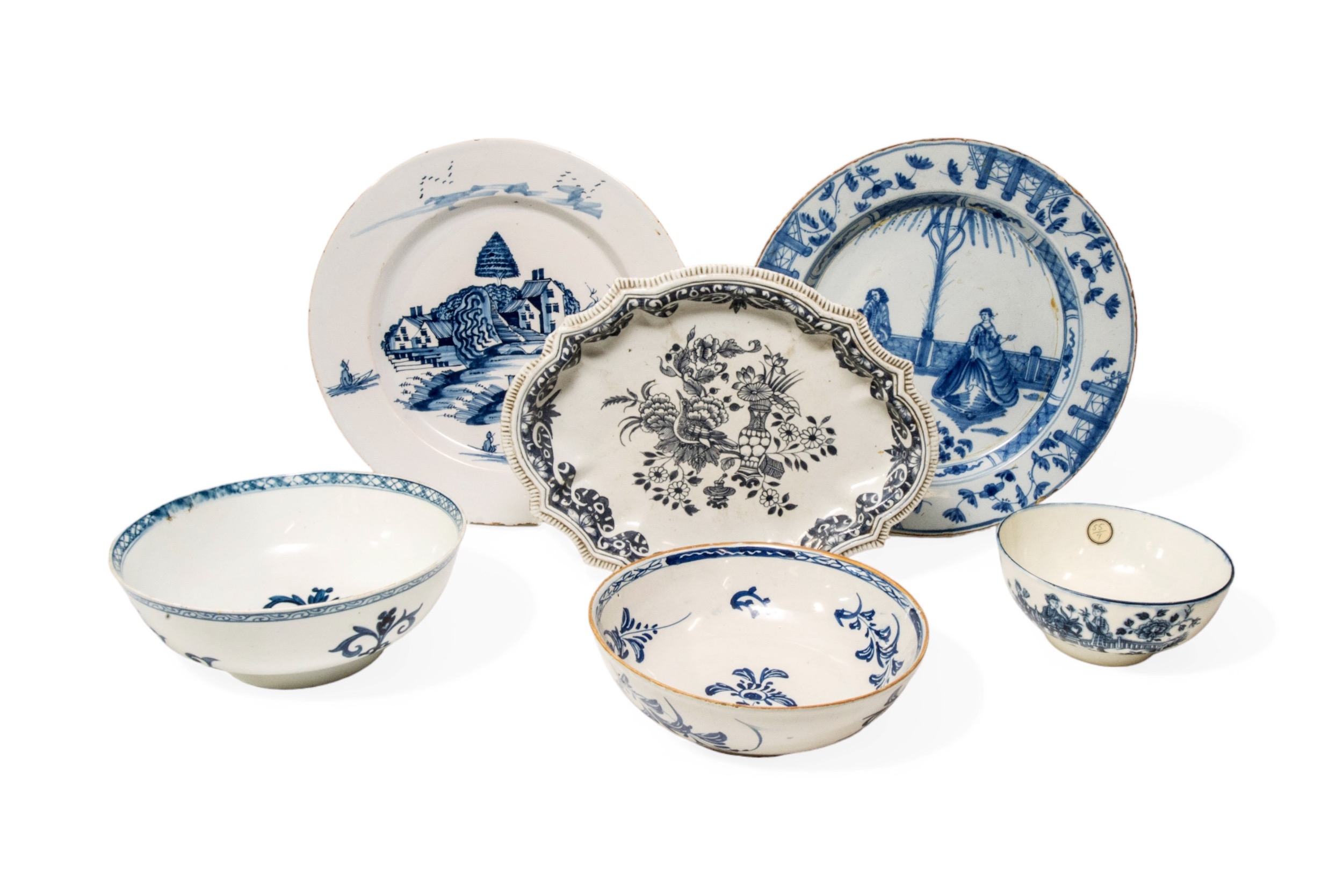 TWO DELFT CHARGERS Mid 18th century, once with two figures in European dress, together with a