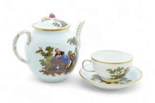 A ZURICH TEAPOT AND A CUP AND SAUCER Circa 1770 painted figures in a landscape, 16cms