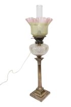 A SILVER CORINTHIAN COLUMN OIL LAMP with cut glass reservoir and vaseline type shade. 66