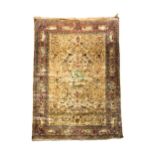 AN OUTSTANDING HAND KNOTTED SILK ISFAHAN RUG, LATE 19TH/EARLY 20TH CENTURY, the central lozenge