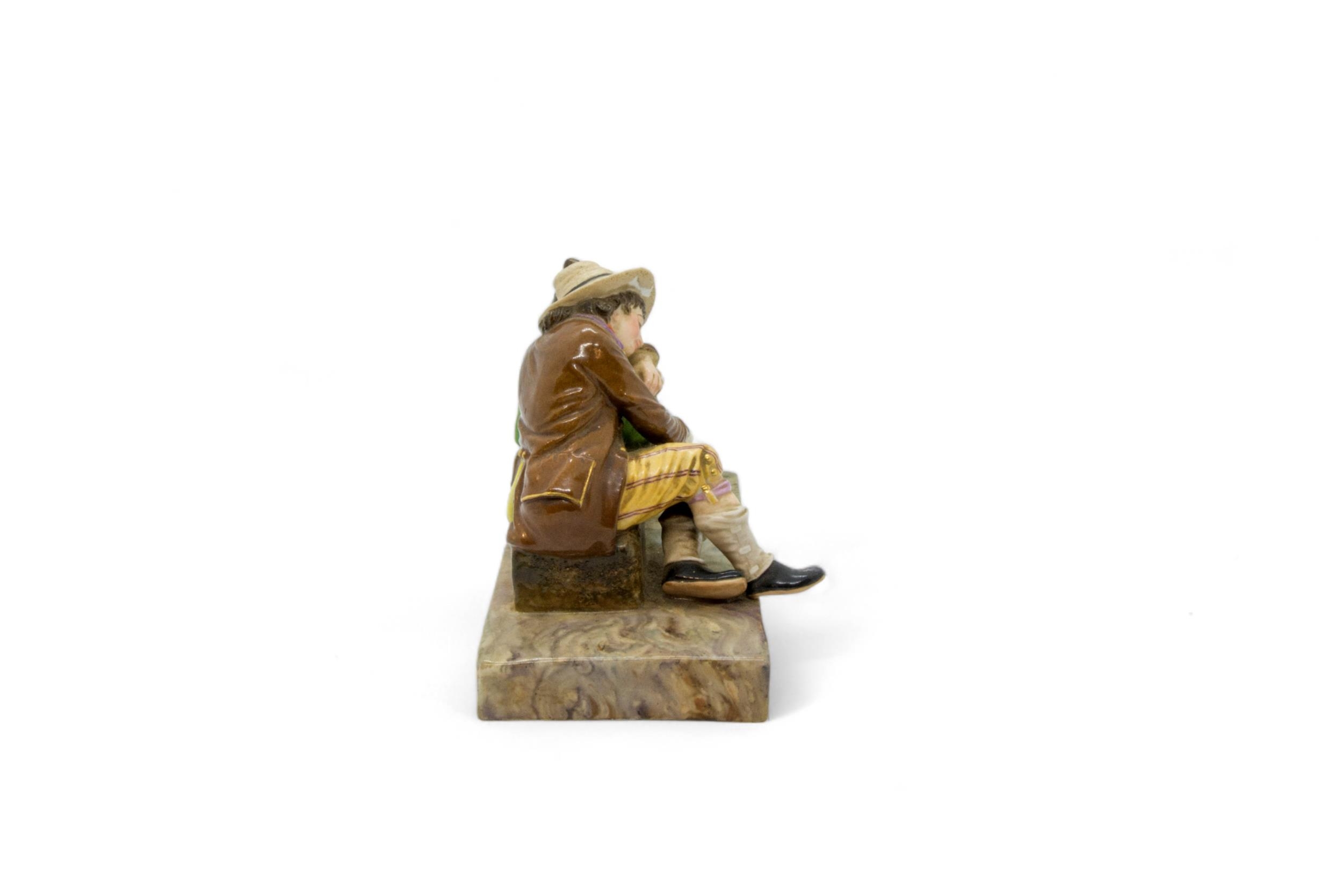 A 19TH CENTURY FIGURAL GROUP A boy sleeping next to a performing monkey, 13cms wide - Image 4 of 4