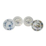 A LIVERPOOL DELFT PLATE Circa 1760, painted in Fazakerley palette and three other Delft plates