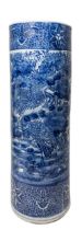 A CHINESE BLUE AND WHITE CERAMIC STICK STAND, LATE QING DYNASTY, the cylindrical sides decorated