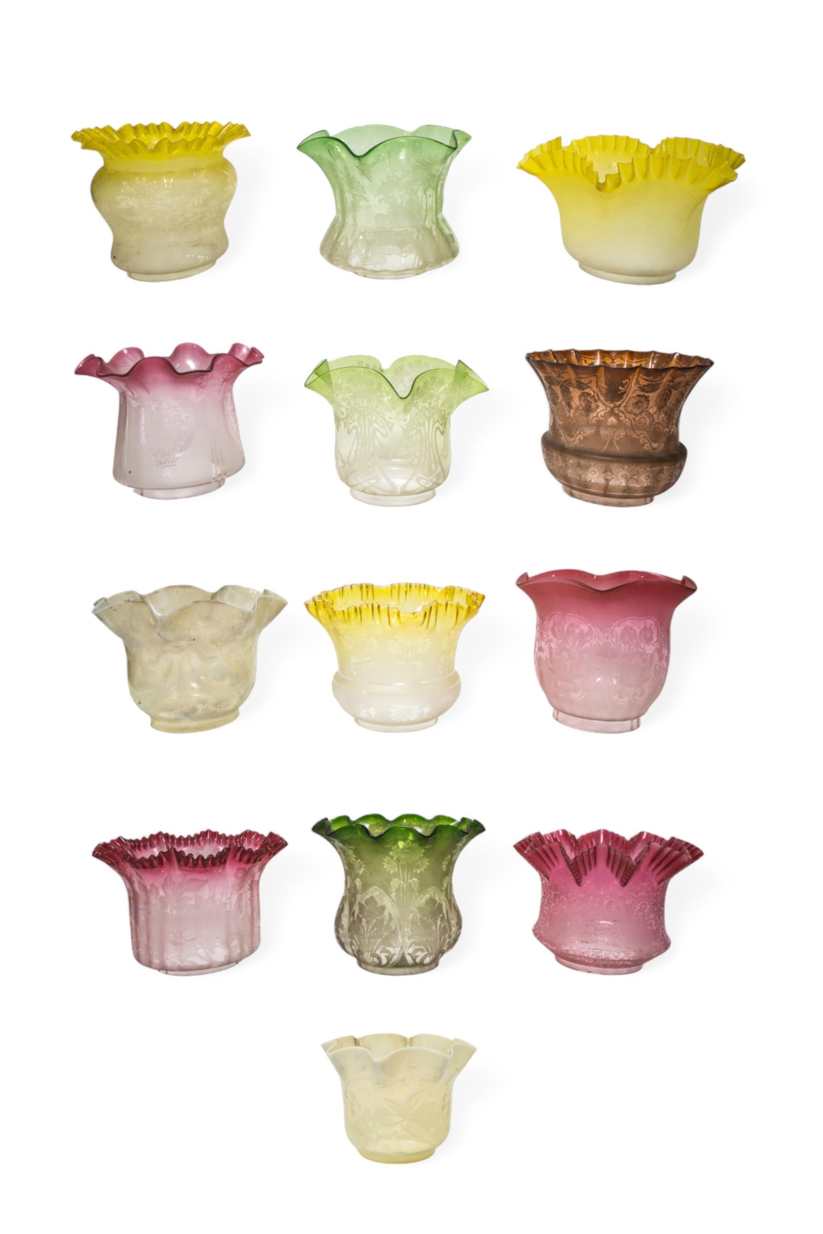 A MIXED GROUP OF 19TH CENTURY OIL LAMP SHADES, consisting of some cranberry tinged and green