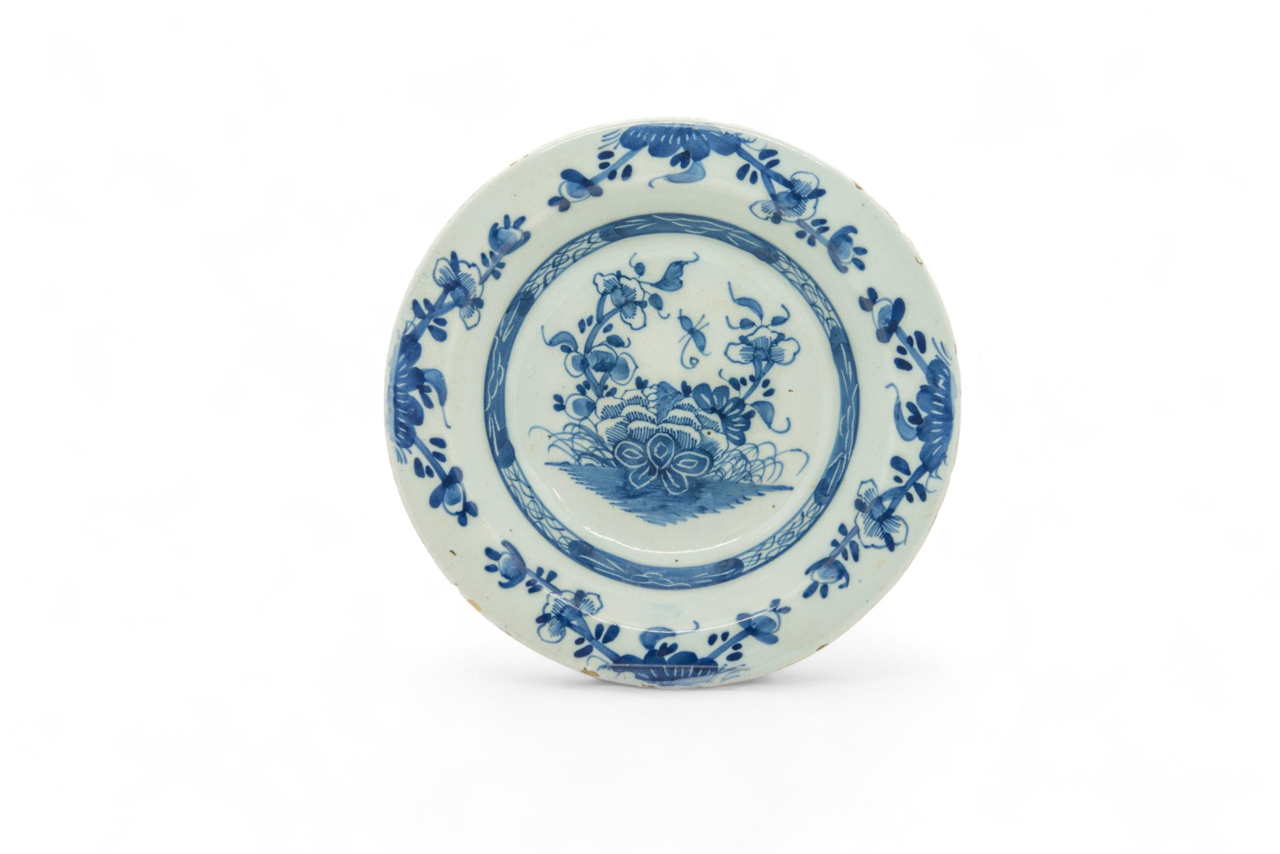 FIVE DELFT PLATES AND A SOUP PLATE 18th century, 23cms wide