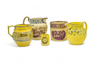 TWO CANARY YELLOW AND SILVER LUSTRE JUGS Circa 1810, together with a miniature canary yellow mug and