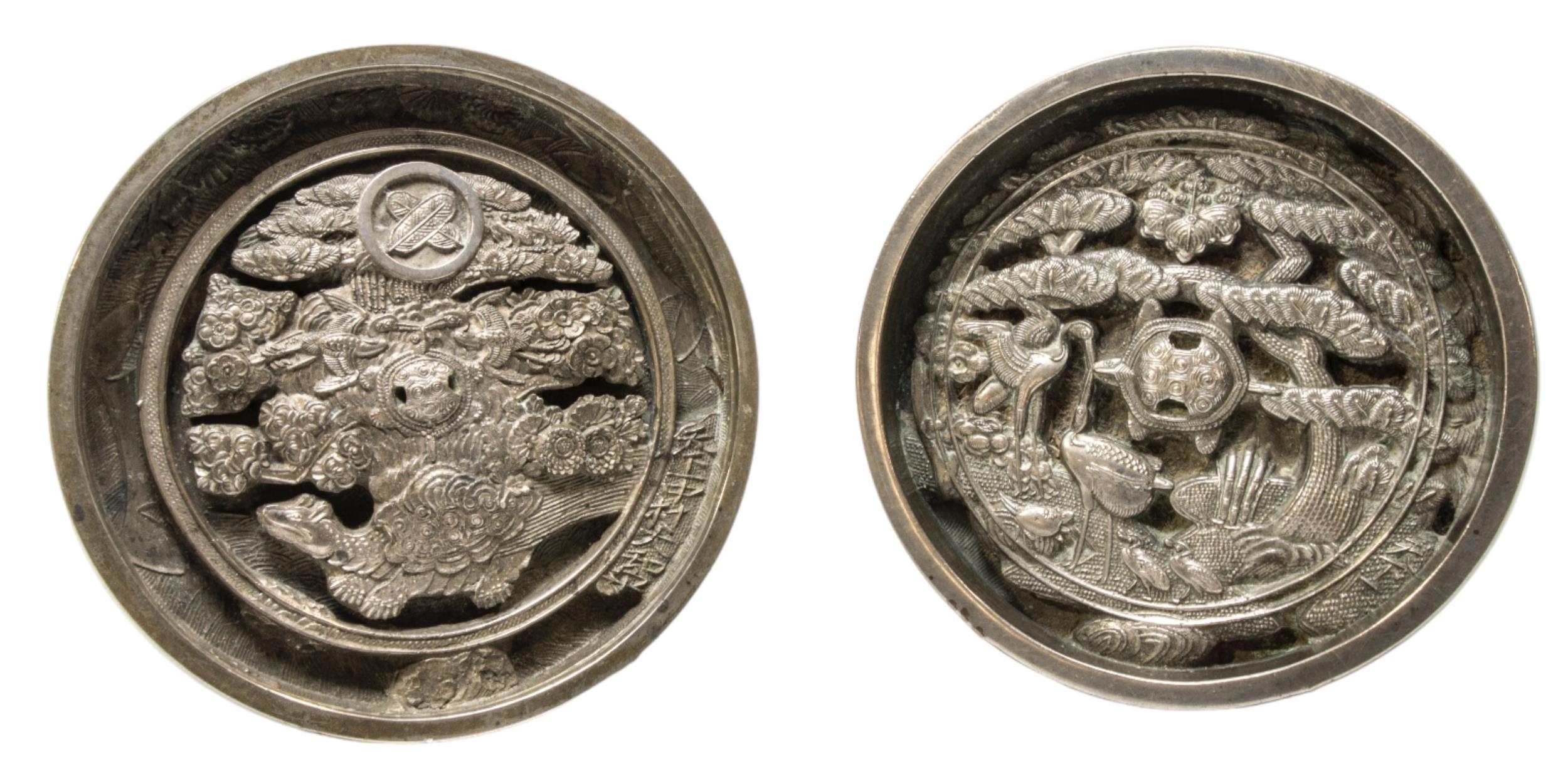 TWO JAPANESE BRONZE MIRRORS, EDO PERIOD, the relief cast centres decorated with tortoises and cranes