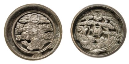 TWO JAPANESE BRONZE MIRRORS, EDO PERIOD, the relief cast centres decorated with tortoises and cranes