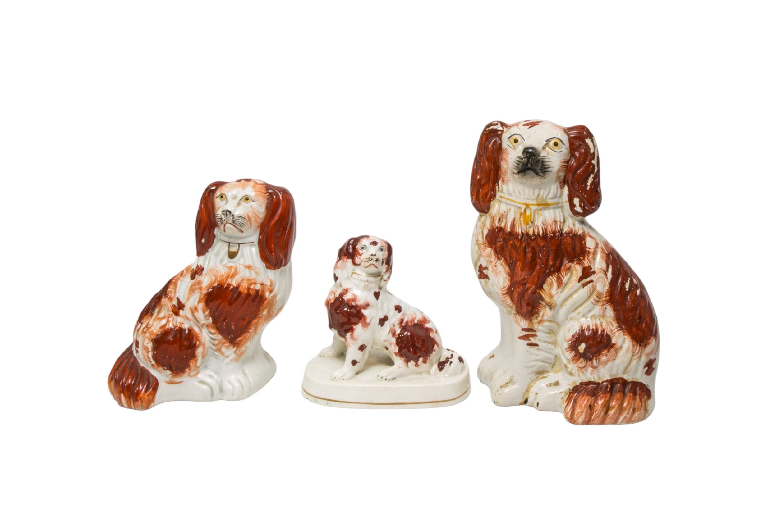 A PAIR OF STAFFORDSHIRE CATTLE DECORATED SPILL VASES AND THREE SPANIEL FIGURES, 19TH CENTURY, the - Image 3 of 3