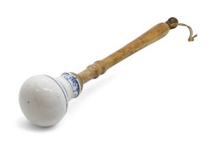 A MEISSEN BLUE ONION PESTLE 19th /20th century, mounted on wooden shaft, 29cms