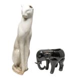A STYLIZED CERAMIC MODEL OF 'THE CAT ON THE STAIRS', mascot of Heal's Shopbase, cream ground, on