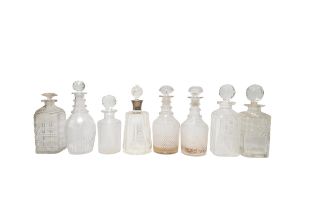 A MIXED GROUP OF EIGHT 19TH CENTURY CUT GLASS DECANTERS, the lot includes three square form