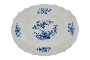 AN OVAL WORCESTER PLATE Circa 1770 with osier moulded border and pseudo Chinese marks to verso,