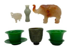 FOUR PIECES OF PEKING GLASS AND A CARVED HARDSTONE ELEPHANT, along with a carved hardstone cup, a