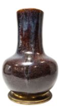 A CHINESE FLAMBE BOTTLE VASE, LATE QING, 19TH CENTURY, globular body rising to a wide cylindrical