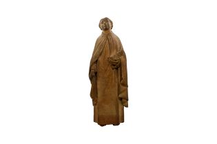A TERRACOTTA FIGURE OF A SAINT 19th century, the saint holding a book and his cloak in the other