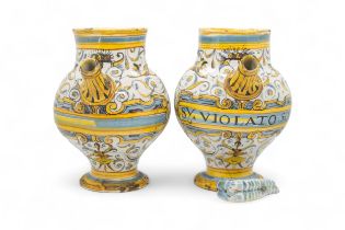 TWO FAIENCE SYRUP JARS 17th century or later, 20cms