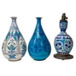 THREE ISNIK STYLE BOTTLE VASES, PERSIAN/NEAR EASTERN, 19TH CENTURY, two of large drop form, the