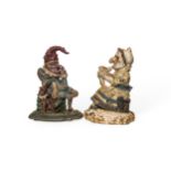 IRON PUNCH AND JUDY DOORSTOPS (Not a pair) with degraded paint finish. 31 cms max