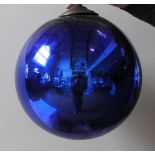 A LARGE BLUE WITCHES BALL 40cms in diameter approx.