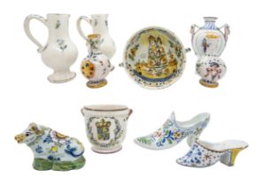 A GROUP OF SMALL FAIENCE ITEMS, MAINLY 18/19TH CENTURY, the lot includes a cup decorated with a