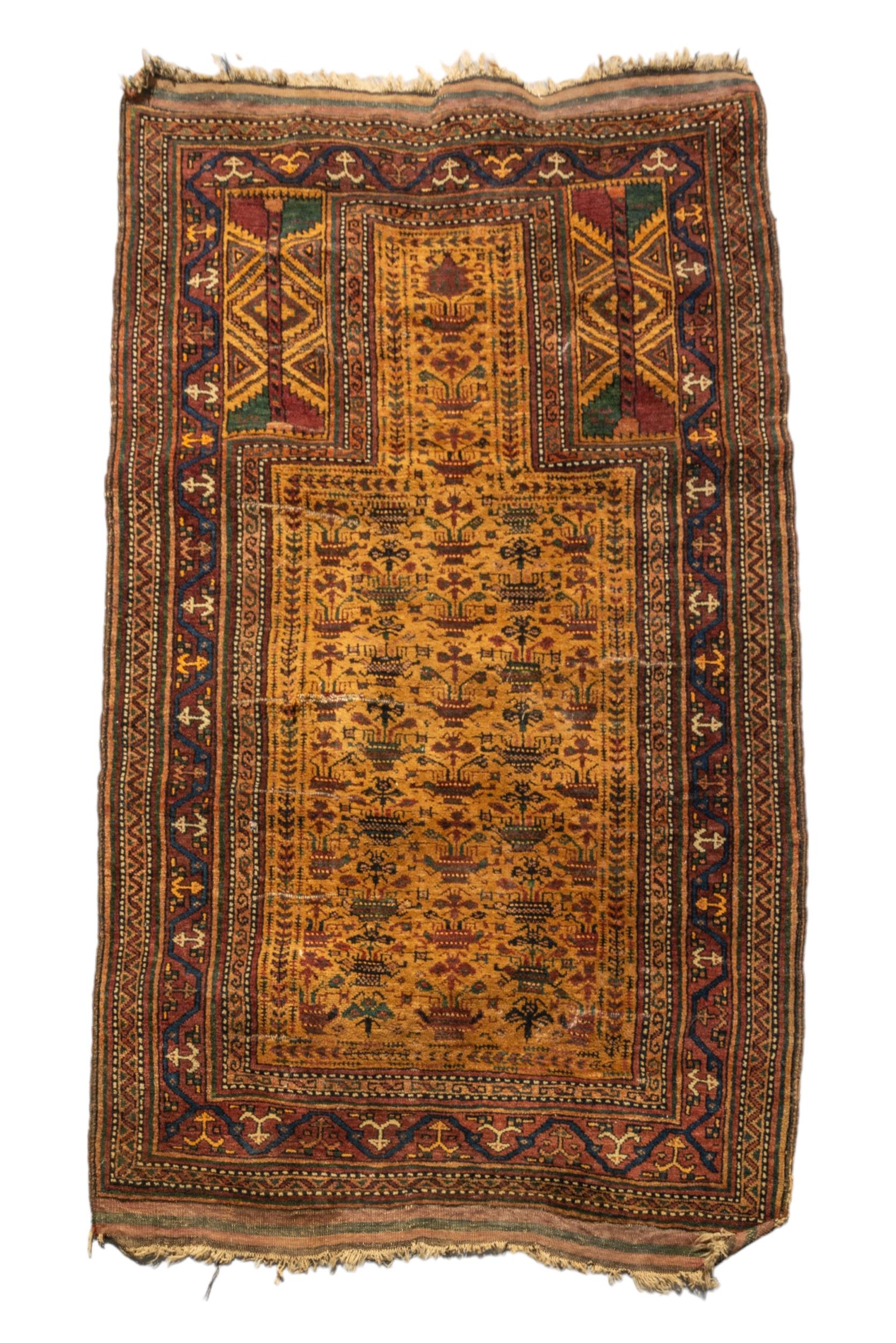 A HAND KNOTTED PERSIAN WOOL BELOUCH PRAYER RUG, LATE 19TH / EARLY 20TH CENTURY, with flat weave